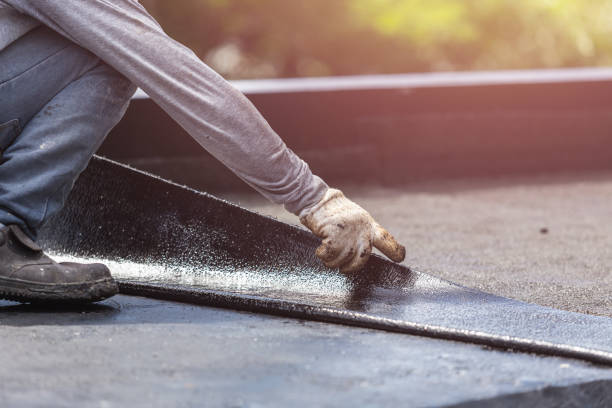 Professional Emergency Waterproofing technician working in Menominee, MI